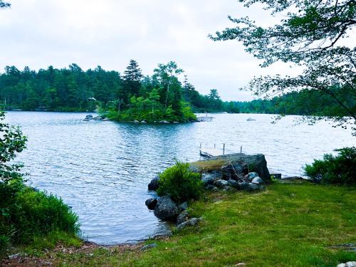 a large body of water with a island in it at Phillips Serenity Retreat in Dedham