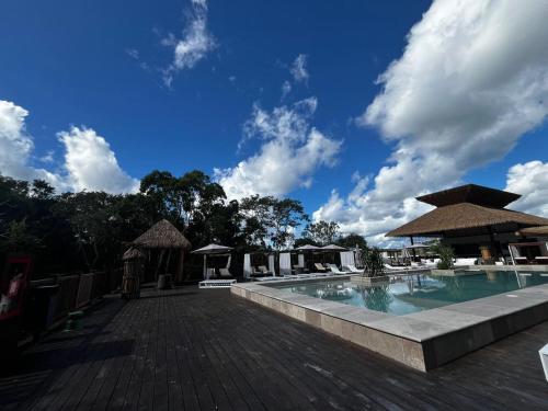 a pool at a resort with at Hotel Mundo Maya Calakmul in Xpujil
