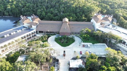 an overhead view of a large building with a courtyard at Hotel Mundo Maya Calakmul in Xpujil
