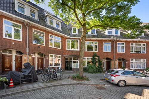 a brick building with bikes parked in front of it at De Hill Rotterdam in Rotterdam