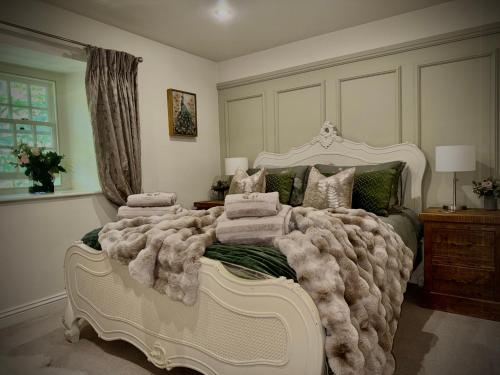 Ένα ή περισσότερα κρεβάτια σε δωμάτιο στο River Dance Cottage, Aysgarth