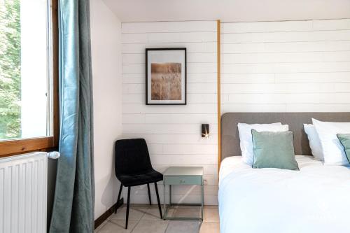 Ένα ή περισσότερα κρεβάτια σε δωμάτιο στο Chalet Galianor - 4 étoiles