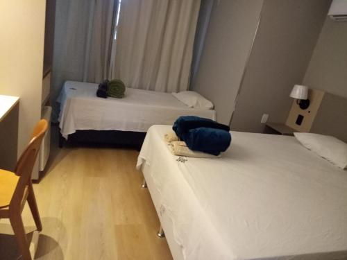 Postel nebo postele na pokoji v ubytování Zuppolini Hotel