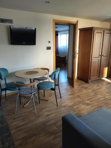 TV a/nebo společenská místnost v ubytování Apartament Gaya
