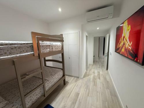 Ένα ή περισσότερα κρεβάτια σε δωμάτιο στο Departamento Lujoso #803 en Karibao