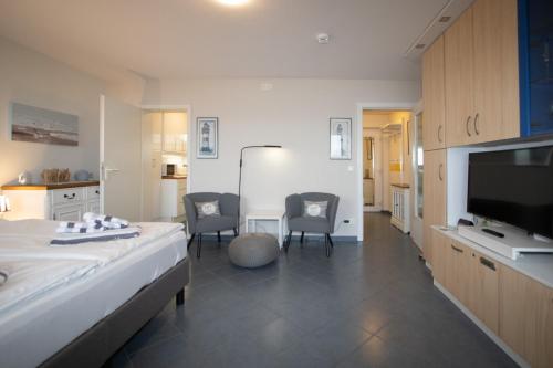 Η κουζίνα ή μικρή κουζίνα στο Residenz am Meer Heef