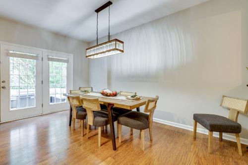 a dining room with a table and chairs at Playroom and Home Office Family Retreat in Mauldin! in Mauldin