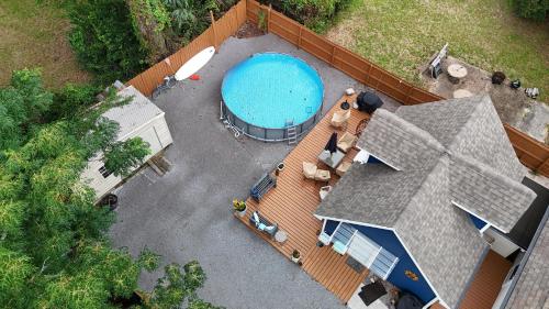 an overhead view of a swimming pool on a house at By the Bayou in Pensacola