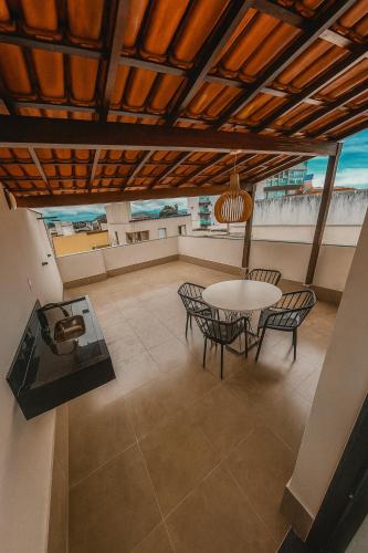 Et opholdsområde på Cobertura - Praia do Morro