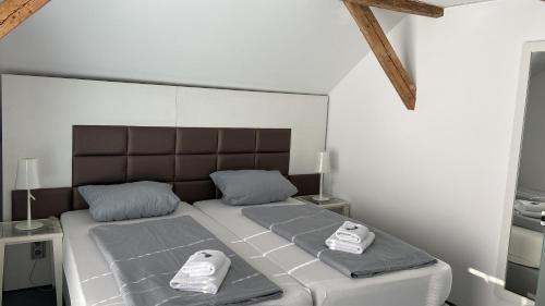 Postel nebo postele na pokoji v ubytování Hotel Leitner