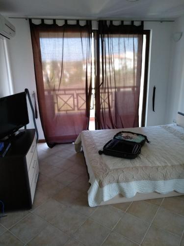 Postel nebo postele na pokoji v ubytování Oasis Resort&Spa Lozenets Studio 1-2