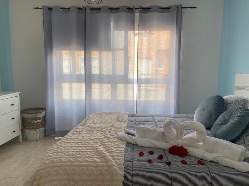 Ένα ή περισσότερα κρεβάτια σε δωμάτιο στο Apartment in Tenerife with Sea Views