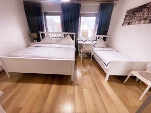 Cama o camas de una habitación en Haus Leipheim