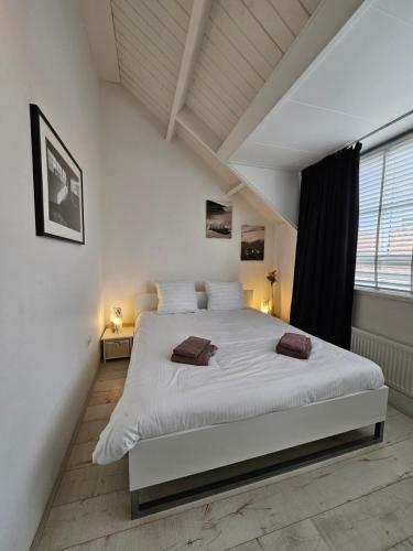 Ένα ή περισσότερα κρεβάτια σε δωμάτιο στο Apartment South