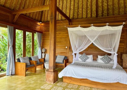 Letto o letti in una camera di Sawah Indah Villa