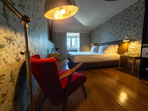 Katil atau katil-katil dalam bilik di Lisboa Carmo Hotel