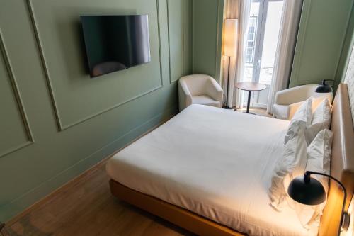 Televisyen dan/atau pusat hiburan di Lisboa Carmo Hotel