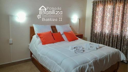 Posada Turística del Paraguay Basiliza IIにあるベッド