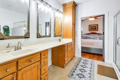a bathroom with a sink and a mirror at 8 Mi to Dtwn Mt Airy Mtn-View North Carolina Home 