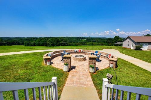a fire pit in the middle of a yard at 8 Mi to Dtwn Mt Airy Mtn-View North Carolina Home 