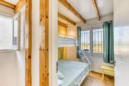 Katil atau katil-katil dalam bilik di Apartamento en Bellcaire
