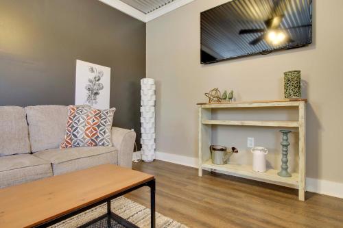 a living room with a couch and a ceiling fan at Close to Uptown and Hospital Greenwood Studio in Greenwood