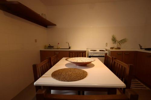a kitchen with a table with a bowl on it at Summer Addicts Home, for the young at heart! in Naousa