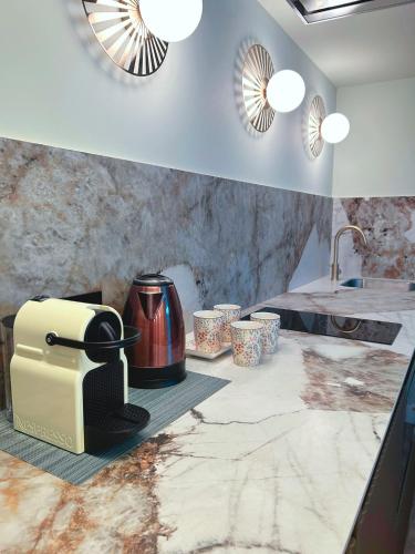 Una cocina o zona de cocina en Lemon Suites Santander