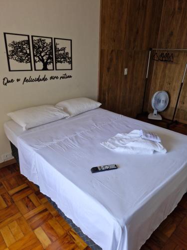 Postel nebo postele na pokoji v ubytování Loft Meu Cantinho