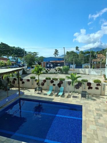 a view of a swimming pool at a resort at Hotel do Sol Executive in São Sebastião