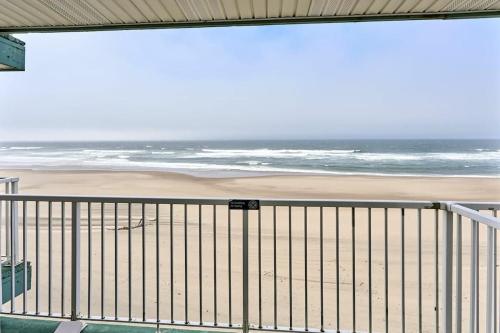 a view of the beach from a balcony at Fireplace Suite With King Bed and Full Kitchen - Pool and Hot Tub Access in Lincoln City