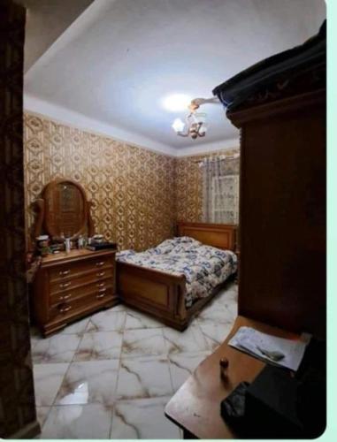 Ένα ή περισσότερα κρεβάτια σε δωμάτιο στο mraco apartment