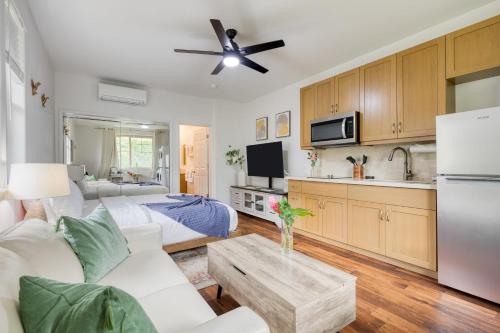 a kitchen and living room with a couch and a table at Studio Nene by AvantStay Chic Cozy King Bed in Waianae