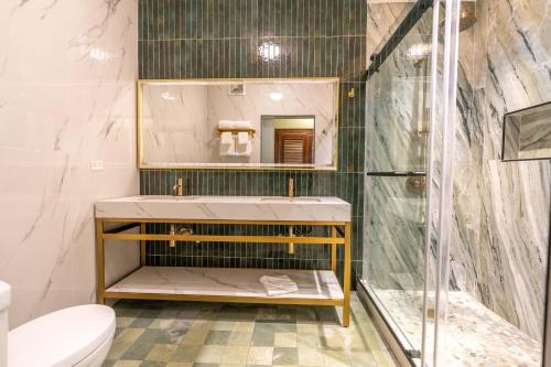 A bathroom at Travellers Beach Resort