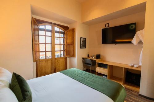 Μια τηλεόραση ή/και κέντρο ψυχαγωγίας στο Sauvé Casa Boutique