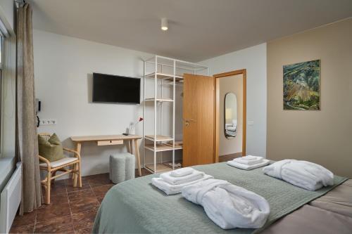 Postel nebo postele na pokoji v ubytování Nyibaer Private Estate