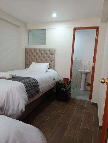 Katil atau katil-katil dalam bilik di Hotel Inka House Chinchero