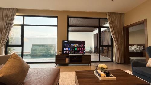 TV a/nebo společenská místnost v ubytování JA Accom