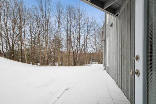 a door to a house in the snow at Big Sunshine in Mont-Tremblant