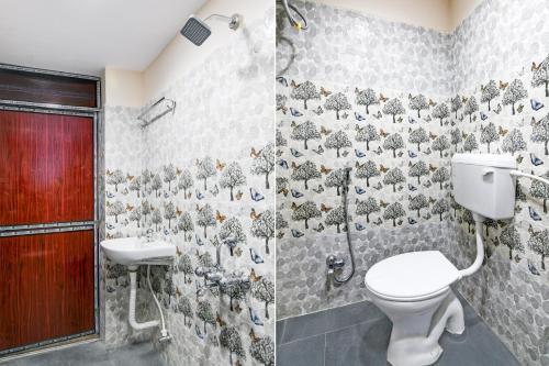 Un baño de Hotel O AB Residency