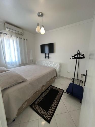 Postel nebo postele na pokoji v ubytování Ap Ubatuba