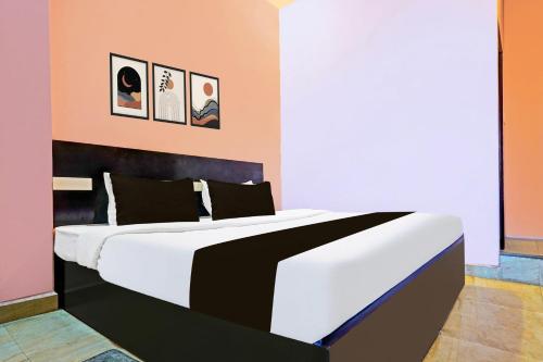 Ένα ή περισσότερα κρεβάτια σε δωμάτιο στο HOTEL O STAR PALACE