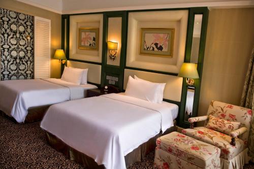 Ένα ή περισσότερα κρεβάτια σε δωμάτιο στο Seaview Resort Xiamen