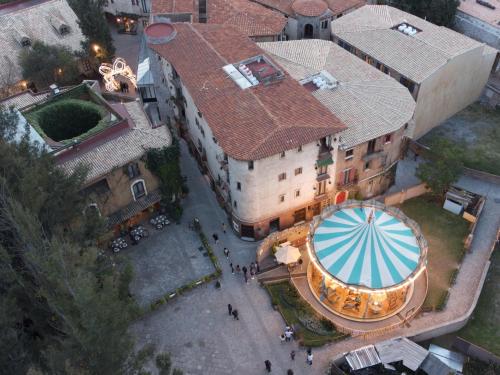 an overhead view of a building with a large tower at Venezia 3 en ValQuirico in Santeagueda