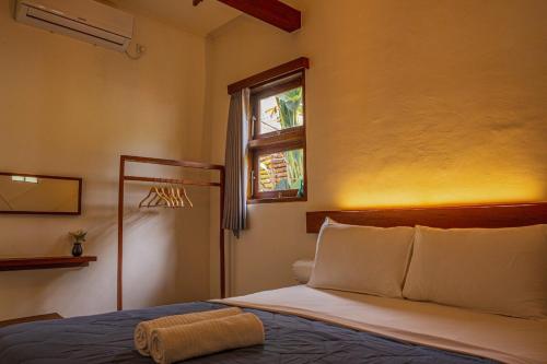 Postel nebo postele na pokoji v ubytování Relax in Nature Villa Namu no1