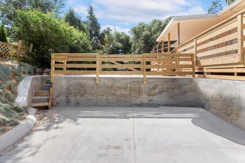 a skateboard ramp with a wooden railing on top of it at 8635 - High on the Hill in Frisco