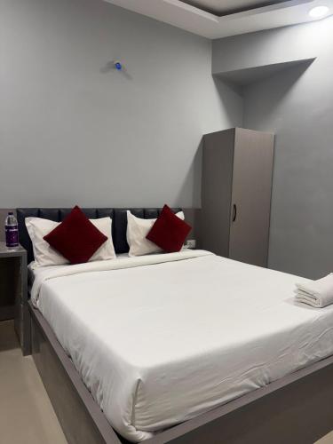 Katil atau katil-katil dalam bilik di Smart Hotels