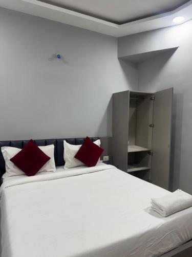 Katil atau katil-katil dalam bilik di Smart Hotels