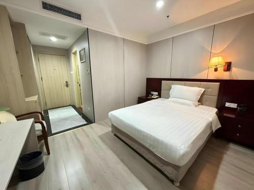 Postel nebo postele na pokoji v ubytování Bashan Hotel