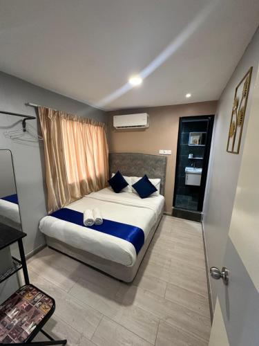 Katil atau katil-katil dalam bilik di SS Grey inn Bukit Bintang